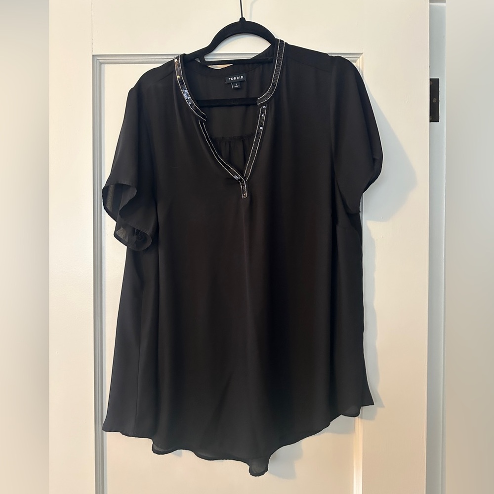 Torrid black sheer style blouse with silver neck line